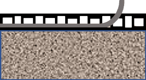 Colocar la rejilla y 2 cm de tierra negra